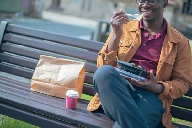 istock Enjoying the healthy take out on the bench 1316967171