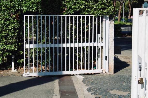 istock Gate open metal gate of a building 1316975242