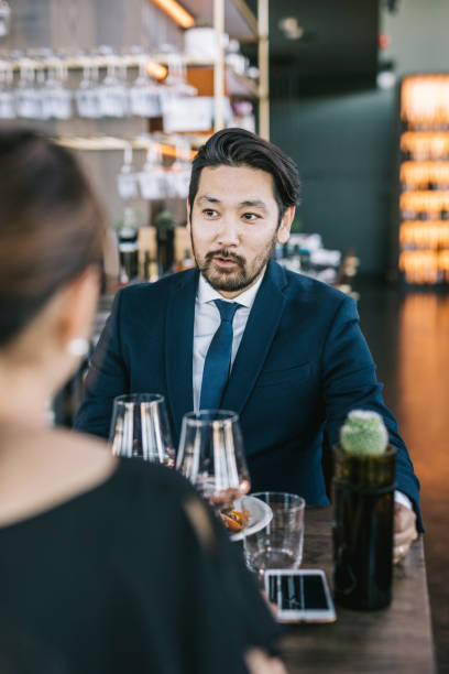 istock Japanese couple at restaurant 1316976335