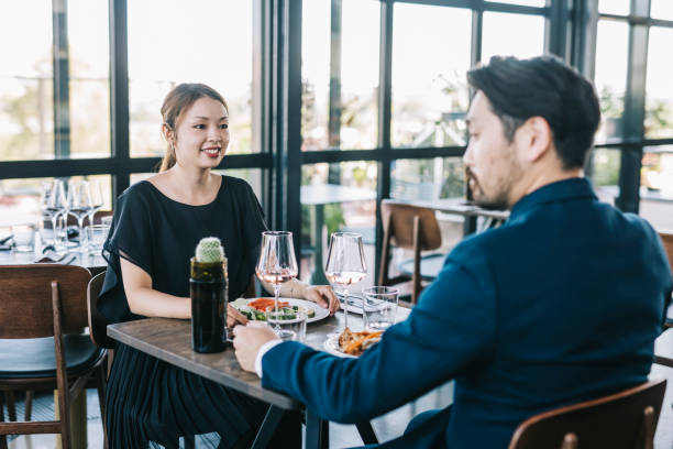 istock Japanese couple at restaurant 1316976353