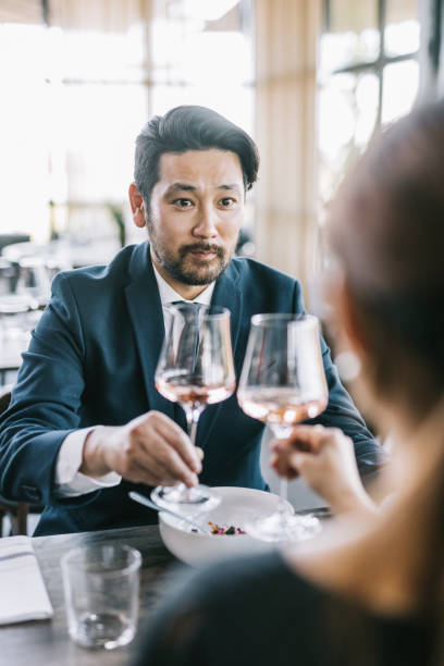 istock Japanese couple celebrating anniversary at a restaurant 1316976380
