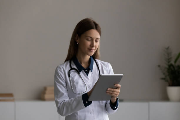 istock Young female doctor talk on video call on pad 1316977215