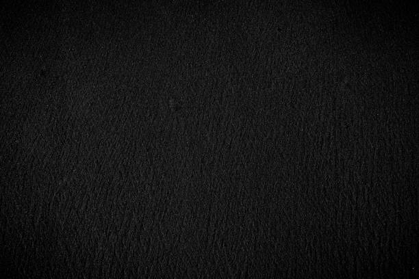 istock Black sand volcanic on the beach texture 1316979258