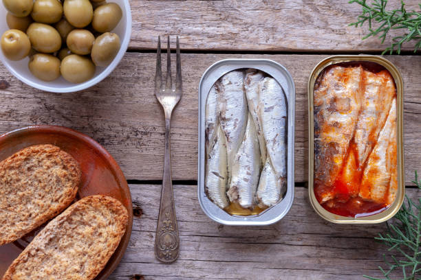 istock Cans of sardines, olives and lemon 1316979431