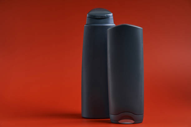 istock Two blank dark plastic container of shower gel or shampoo 1316979965