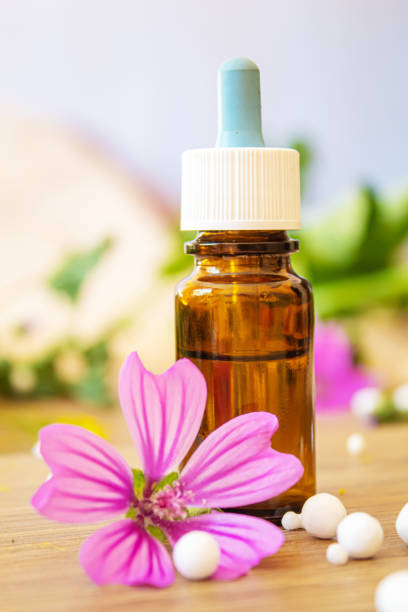 istock medicinal herbs, oils in small bottles homeopathy. selective focus 1316985129