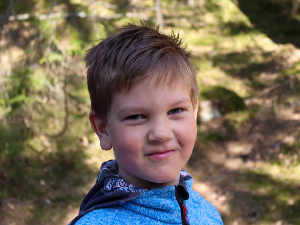 istock Happy boy in woodland 1316986438