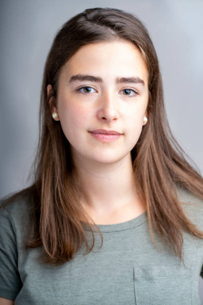 istock Smiling young woman studio portrait 1316986798