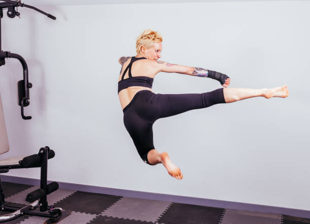istock Athletic woman training in the gym 1316986799