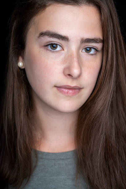 istock Serious young woman studio portrait 1316986948
