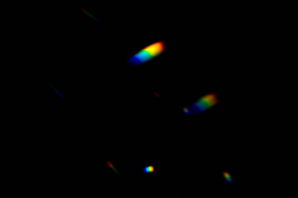 istock colorful warm rainbow crystal light leaks on black background 1316993511