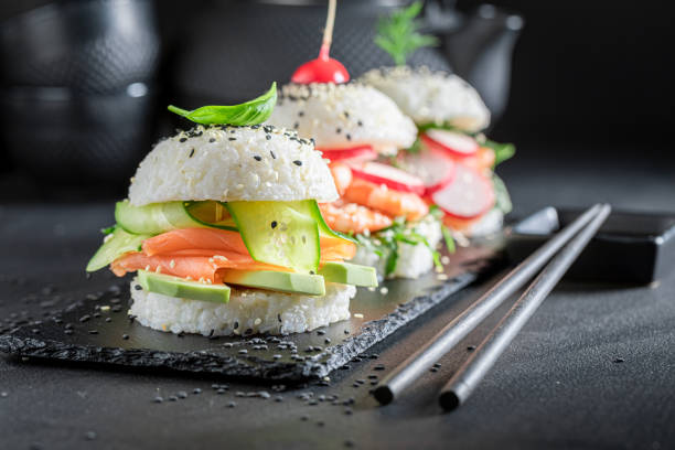 istock Healthy sush burger with rice and seafood sprinkled with sesame. 1316994761