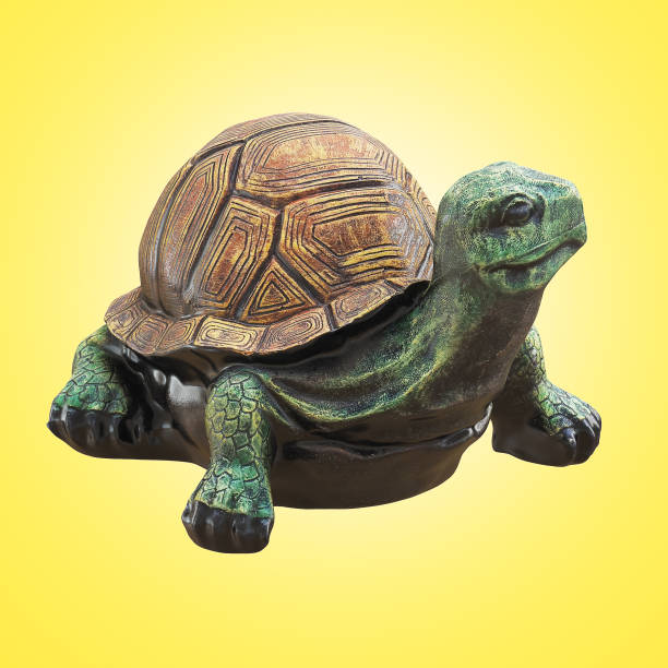 istock Decorative ceramic figurine of a turtle on a yellow background. 3d rendering 1317000550