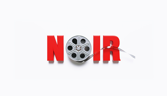 Film reel forming the noir word on white background. Horizontal composition with clipping path and copy space. Directly above. Film Noir genre concept.