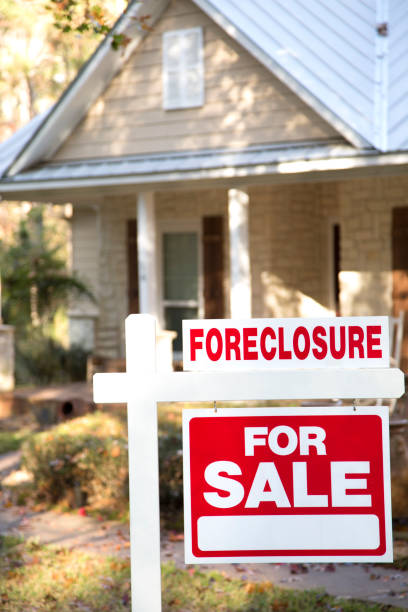 istock Home for sale with real estate sign.  Front yard. 1317001399