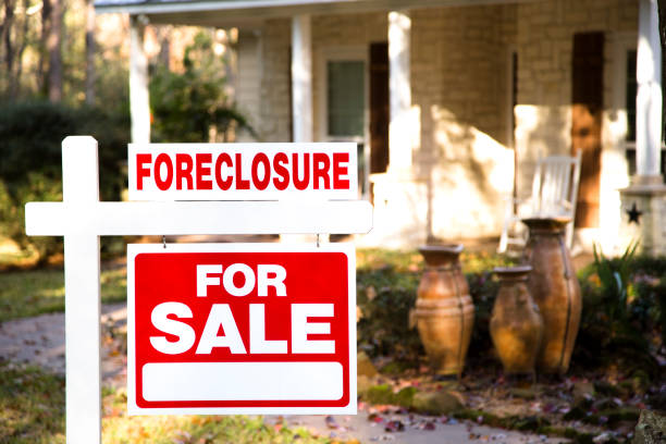 istock Home for sale with real estate sign.  Front yard. 1317001400