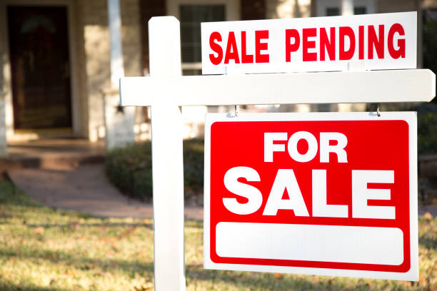 istock Home for sale with real estate sign.  Front yard. 1317001643
