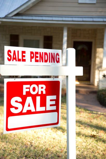 istock Home for sale with real estate sign.  Front yard. 1317001674