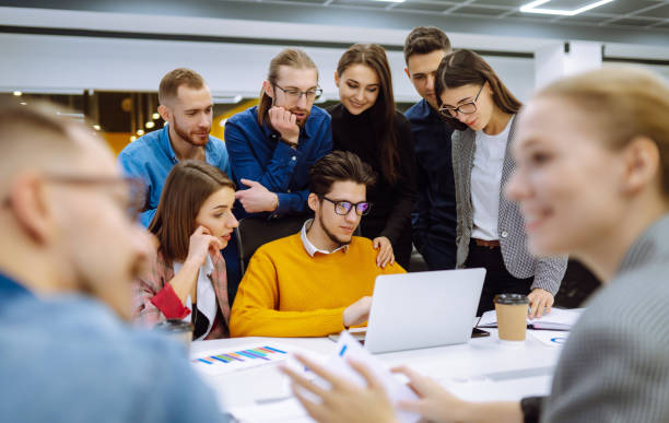 istock Business colleagues working together in creative office. 1317001784
