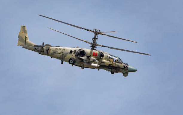 ZHUKOVSKY, RUSSIA - SEPTEMBER 01, 2019: Demonstration of the Kamov Ka-52 Alligator attack helicopter of the Russian Air Force at MAKS-2019, Russia. ZHUKOVSKY, RUSSIA - SEPTEMBER 01, 2019: Demonstration of the Kamov Ka-52 Alligator attack helicopter of the Russian Air Force at MAKS-2019, Russia. russian military photos stock pictures, royalty-free photos & images