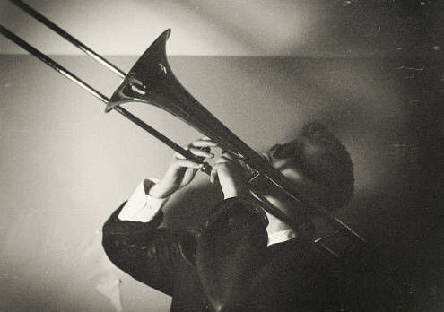 studio shoot of a male trombone player