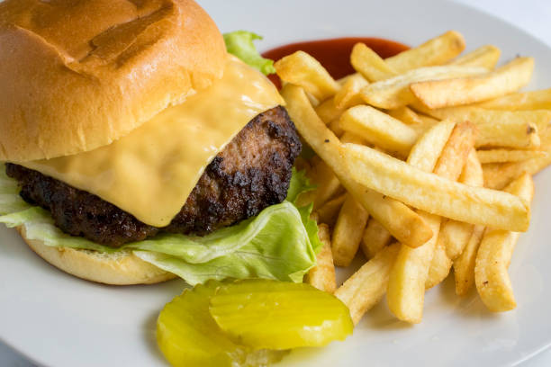 istock chicken cheese burger with fries 1317005894