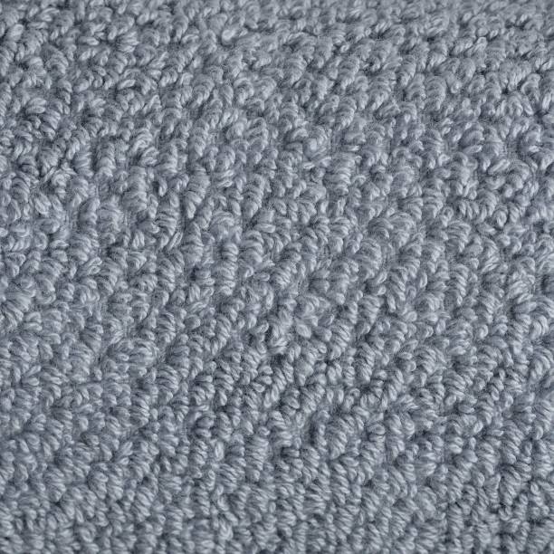 istock Dusty blue popcorn textured bath towel close up 1317006046