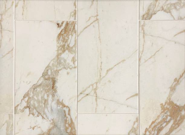 istock Gold porcelain floor and wall tile texture with marble pattern 1317006570
