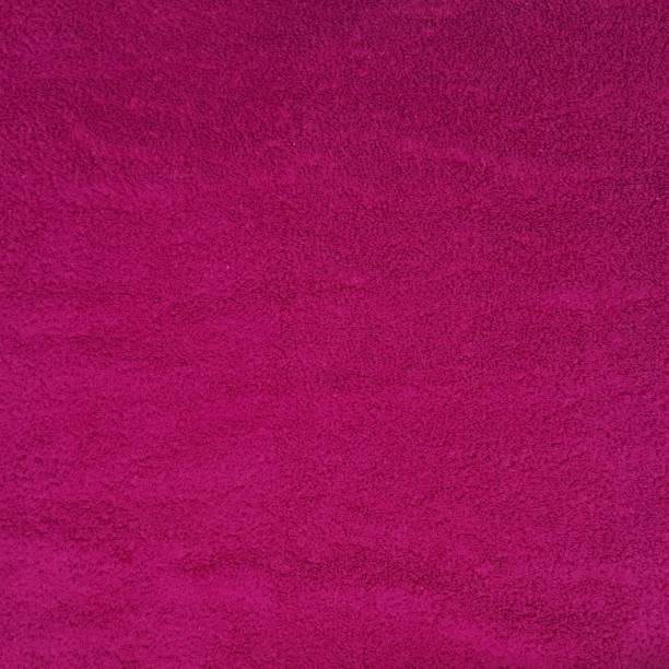 terry handtuch textur in magenta farbe - softness textile pink terry cloth stock-fotos und bilder