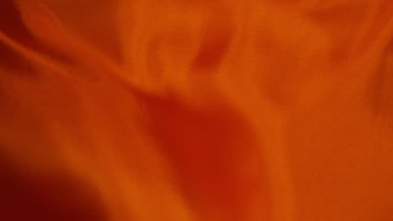 Waving orange satin