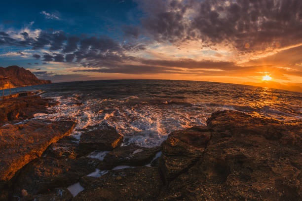 istock Sunset by the sea 1317011158