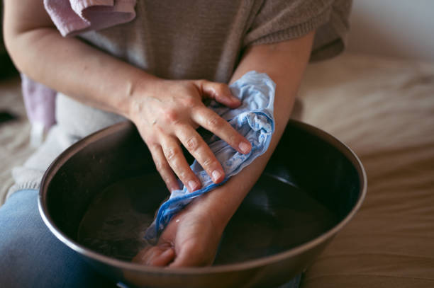 istock Woman treating burns on her hand 1317012253