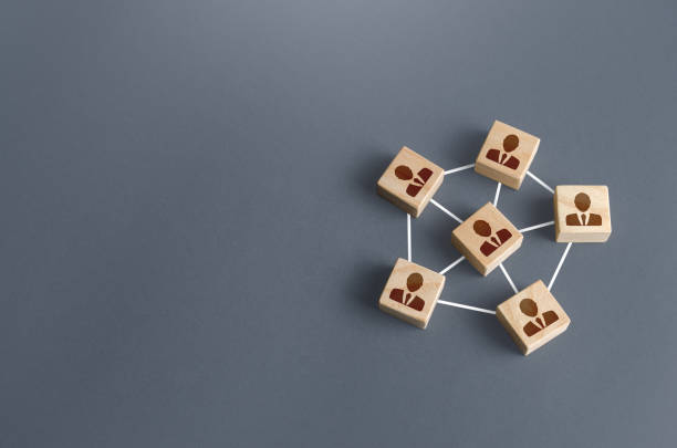 istock Blocks with businessmen connected by lines into a network team. Participation and assistance in a common project. Communication and feedback. An efficient small optimal compact business team. 1317019813