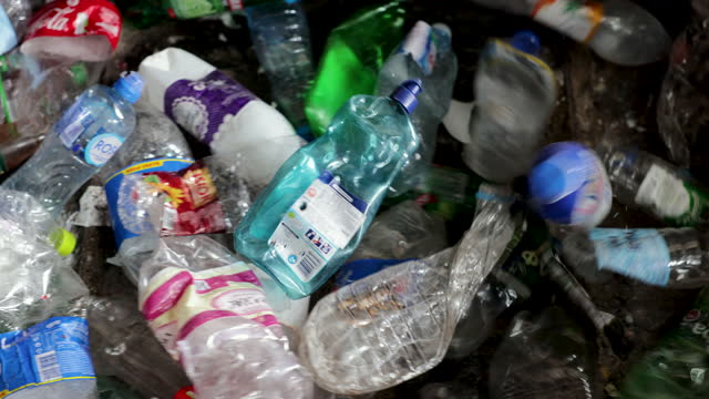 Colorful plastic bottles in the recycling process