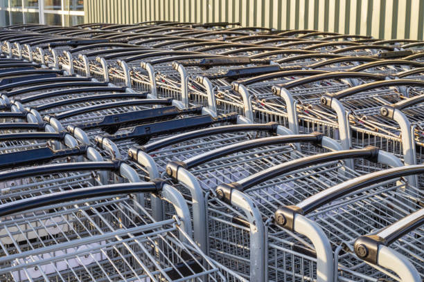 istock Shopping carts in a row outside a store 1317027280
