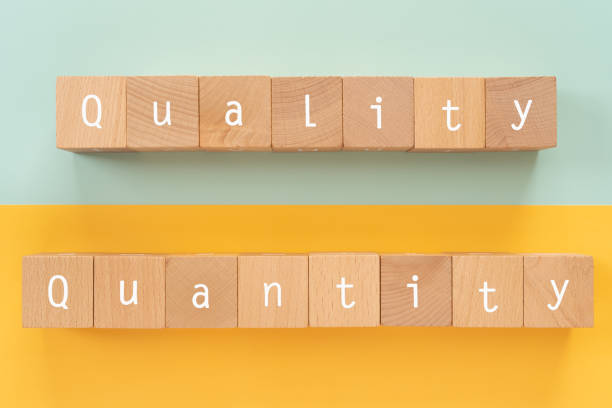 istock Quality and quantity; Wooden blocks with 