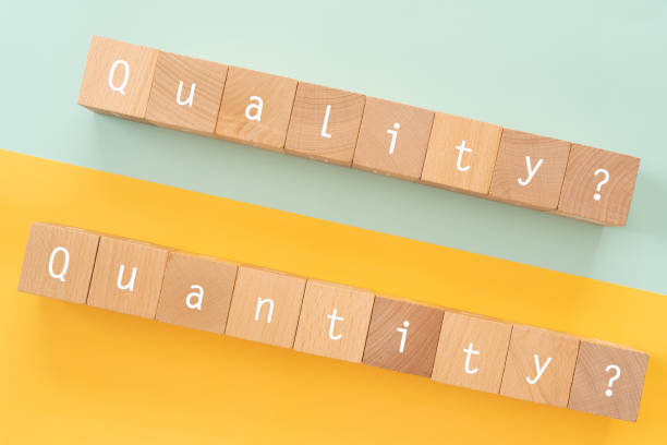 istock Quality and quantity; Wooden blocks with 