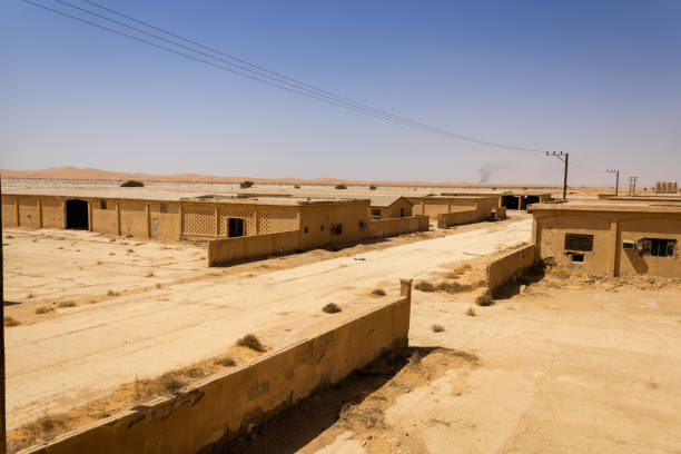istock Abandoned barracks in the desert 1317027908