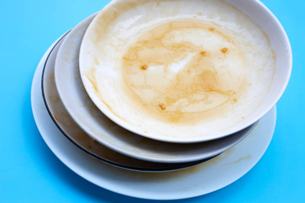 istock Dirty dishes on blue background. 1317035071