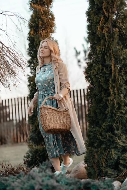 istock A girl with a wicker casserole in her hands. 1317035240