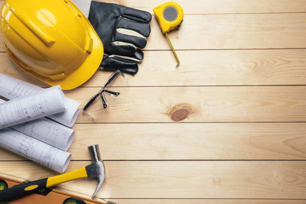 istock Work safety. Standard Construction site protective equipment on  top view wooden background, flat lay, copy space,safety first concepts. 1317036356