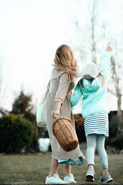 istock Mom and daughter at a picnic. 1317036646