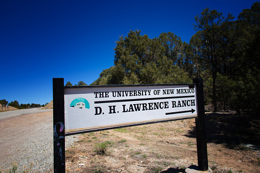 San Cristobal, NM: A road sign announcing the D.H. Lawrence Ranch, just north of Taos. Lawrence lived at the ranch for 2 years in the 1920s.