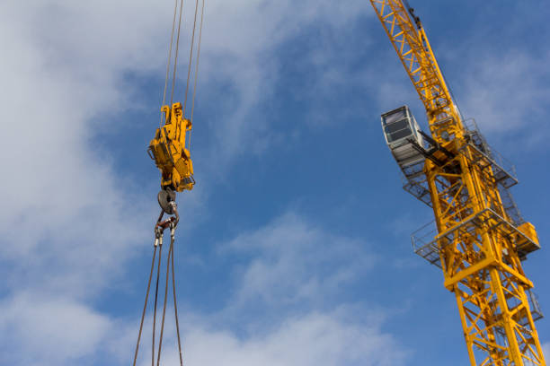 istock Tower crane against the blue sky. Construction equipment 1317039674