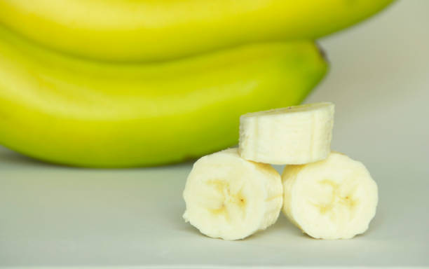 istock three banana slices on a gray background 1317042190