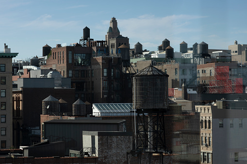 View of rooftop water tanks in the NoHo neighborhood of New York City.