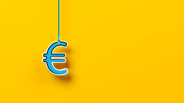 istock Blue-colored Euro symbol hanging with rope on the orange-colored background. 1317045740