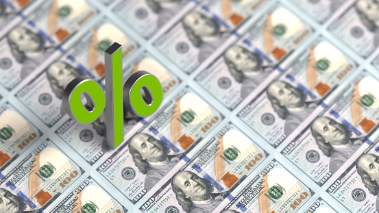 Green-colored percentage Symbol on American paper currency Horizontal composition with copy space Focused image