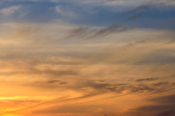 istock swirling golden blue sky 1317052349