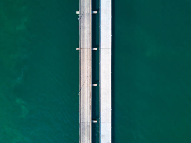 istock Long highway bridge above a ocean 1317052412